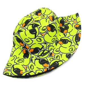Cartoon yellow duck print bucket hat in vibrant neon green fabric for outdoor sun protection