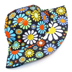 Colorful bucket hat with vibrant daisy floral print for sun protection and stylish travel