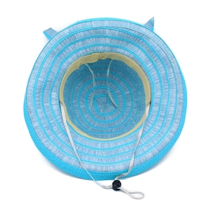 Detail of baby sun hat interior with adjustable chin strap and soft sweatband