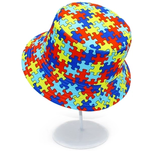 Fashionable unisex bucket hat featuring a vibrant multi-color puzzle print for outdoor style