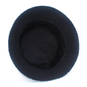 Detail view of bucket hat interior showing durable black lining and reinforced brim stitching