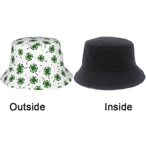 Double-sided sun hat featuring green clover pattern and minimalist solid black side