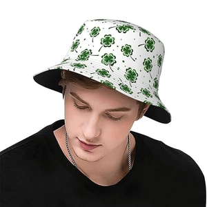Reversible white bucket hat with green clover pattern for sun protection and stylish look