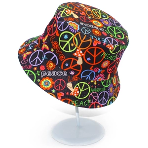 Reversible bucket hat with colorful Peace and Love graffiti prints on black fabric