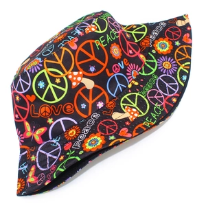 Black bucket hat with colorful Peace and Love graffiti print on a plain white background