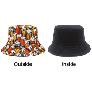 Detail showing reversible bucket hat with beer print on one side and plain black on the other