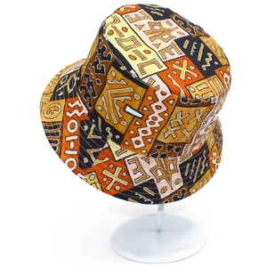 Ethnic tribal print bucket hat in warm orange and brown hues for outdoor sun protection