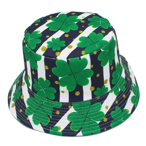 Detail of St. Patrick's Day bucket hat with green clovers and gold glitter dots