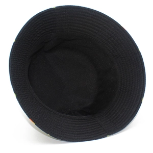 Detailed top view of a black cotton bucket hat with colorful dot patterns and stitching