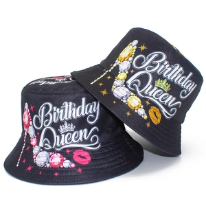 Double-sided Birthday Queen print bucket hat in black with crown and red lips graphic