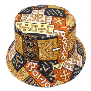Tribal geometric print bucket hat in orange and yellow with vintage patterns