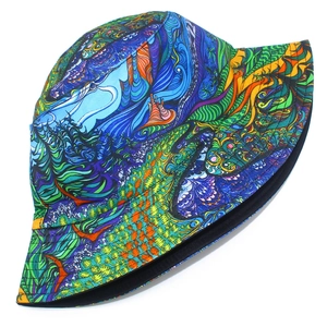 Detail view of double-sided bucket hat with artistic abstract swirl pattern and fine stitching