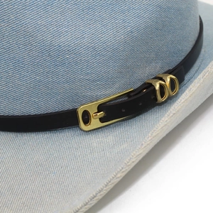 Light blue denim cowboy hat with a black leather band and golden double-D buckle accent