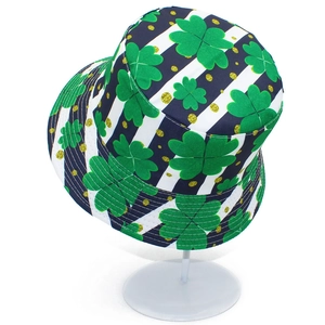 Detail of St. Patrick's Day bucket hat with green clover prints and gold glitter dots
