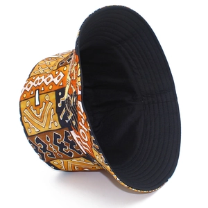 Close-up of ethnic geometric print bucket hat with orange pattern and reinforced stitching