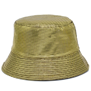 Metallic gold patent leather bucket hat with black grid texture and hip-hop street style