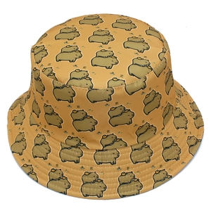 Detailed close-up of a mustard yellow bucket hat featuring cartoon capybara prints