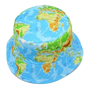 Detailed close-up of the vintage world map pattern and stitching on a blue bucket hat