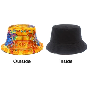Dual-sided bucket hat featuring colorful peace symbols and a simple black interior
