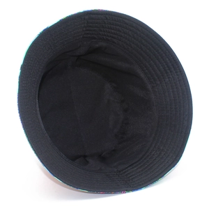 Detail view of the black interior lining and reinforced stitching of a reversible bucket hat