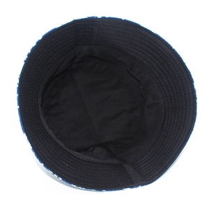 Internal view of bucket hat showing deep crown, black lining, and precise brim stitching