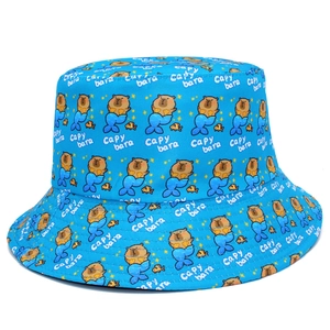 Detailed full print of blue Capybara bucket hat with mermaid tail and star patterns