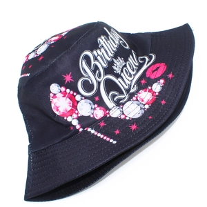 Close-up of Birthday Queen print with pink star and lip motifs on black bucket hat