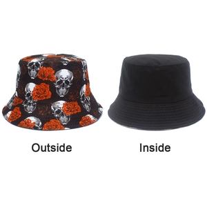 Double-sided bucket hat featuring a skull and rose print and a plain black inside