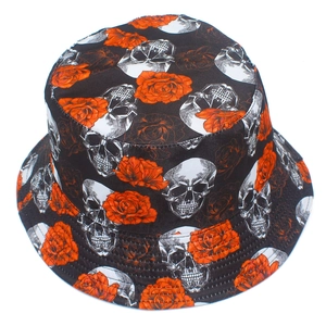 Reversible bucket hat with skull and orange rose print in classic black and white canvas