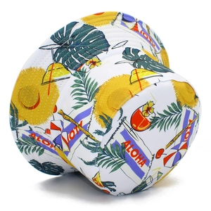 White bucket hat with tropical Aloha print featuring palm leaves and beach motifs