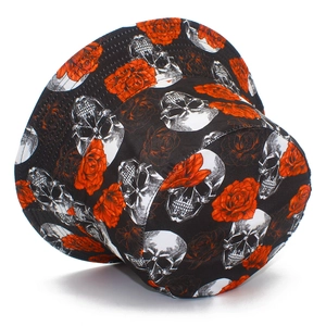 Reversible bucket hat with white skull and red rose print on black cotton fabric