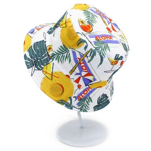 Unisex white canvas bucket hat with tropical Aloha print and summer beach motifs