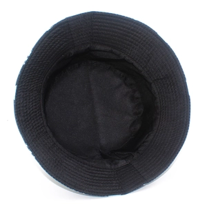 Detailed top view of the inner black lining and reinforced stitching on this skull bucket hat
