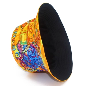 Detail of colorful psychedelic bucket hat with Peace and Love print and black lining