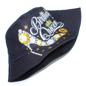 Detail of black canvas bucket hat with Birthday Queen lettering and vibrant party prints