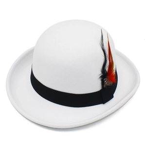 Detailed macro view of white wool felt bowler hat with black ribbon and feather accessory