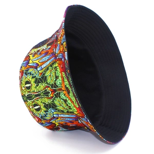 Close-up of bucket hat with psychedelic graffiti print and solid black lining