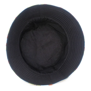 Macro view of the black inner lining and colorful geometric pattern on the sun bucket hat