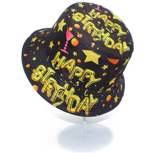 Close-up of black bucket hat featuring gold Happy Birthday balloon text and festive patterns