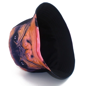 Close-up of a pug face print on a high-quality cotton bucket hat with black lining