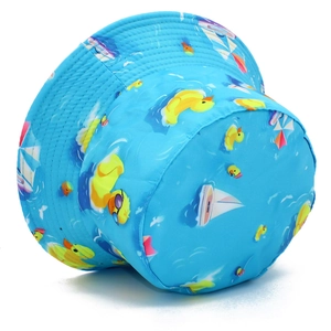 Detail view of water-resistant bucket hat with yellow duck and sailboat print
