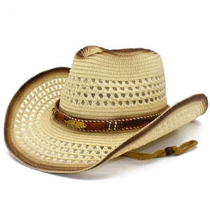 Detail of straw cowboy hat with hollow weave pattern and golden feather charm