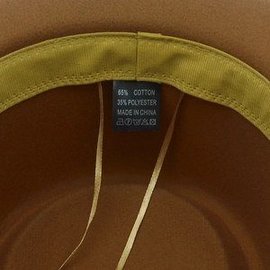 Detail of wool fedora hat interior with cotton blend fabric and adjustable drawcord