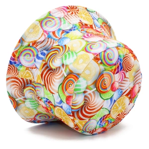 Close-up of colorful lollipop and fruit patterns on high-quality outdoor bucket hat