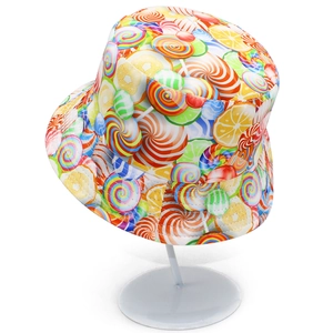 Outdoor bucket hat with vibrant candy and fruit patterns on white background