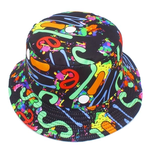 Detailed close-up of vibrant graffiti print and fine stitching on the black bucket hat