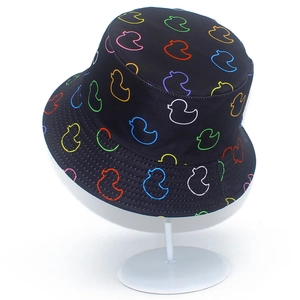 Black bucket hat with neon cartoon duck patterns on white stand for men and women