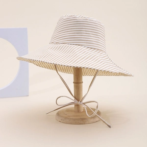 Kids striped sun hat in khaki and white with adjustable drawstring for sun protection