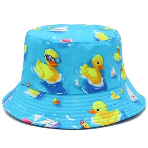 Detail view of sky blue bucket hat with yellow duck and white sailboat cartoon pattern