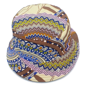 Detailed view of colorful geometric wave pattern and stitching on a canvas bucket hat
